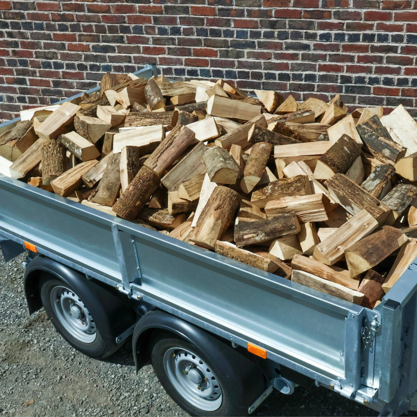 Trailer full of kiln dried ash logs