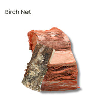 Birch log wrapped in a red mesh net on a white background
