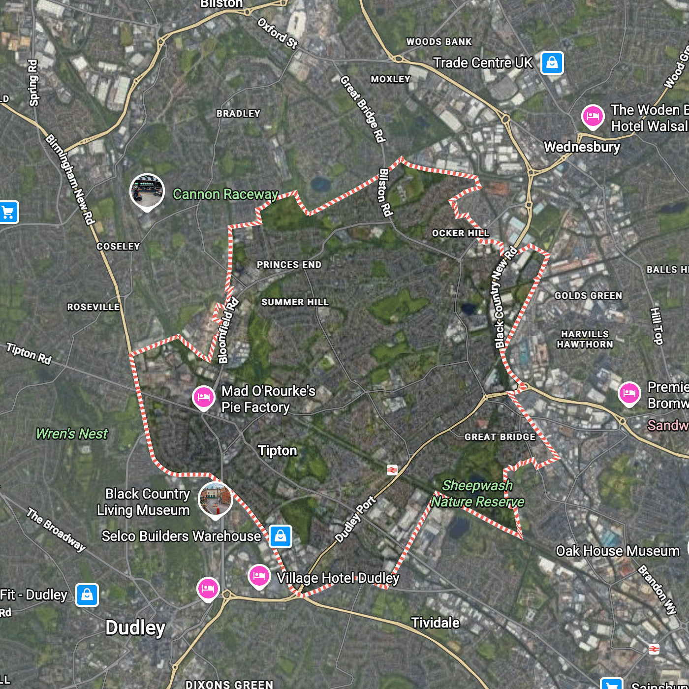 A satellite map view of a tipton area with roads, buildings, parks, and multiple pink location pins marking venues. several place names are visible including Dudley, Tipton, and Wednesbury. these are areas of logs for sale by black country firewood
