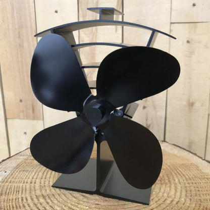 Valiant Premium 4 stove fan with four blades on wooden chopping block 