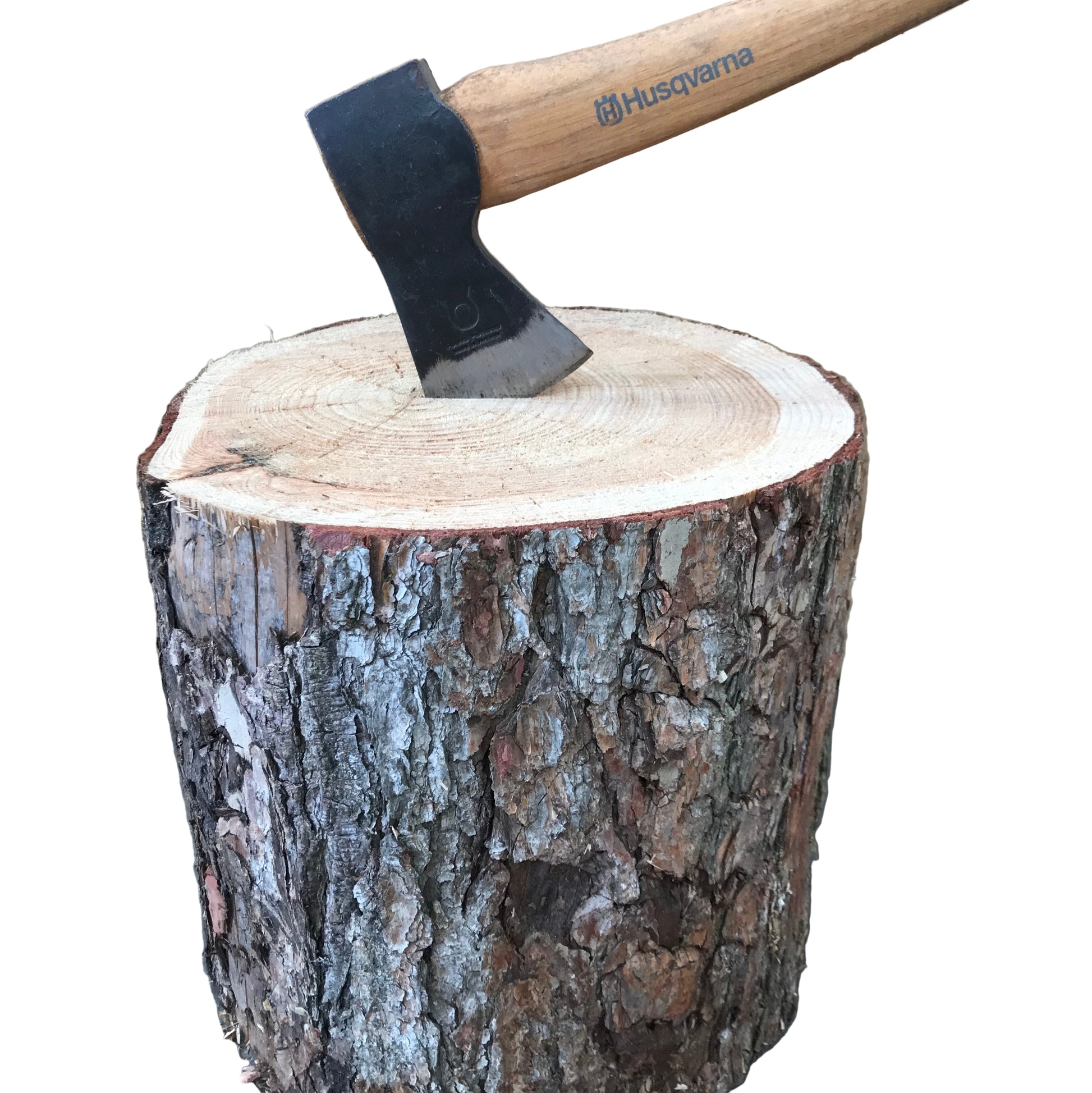 A chopping block with an axe embedded in it, showing the wood grain and a portion of the axe handle.