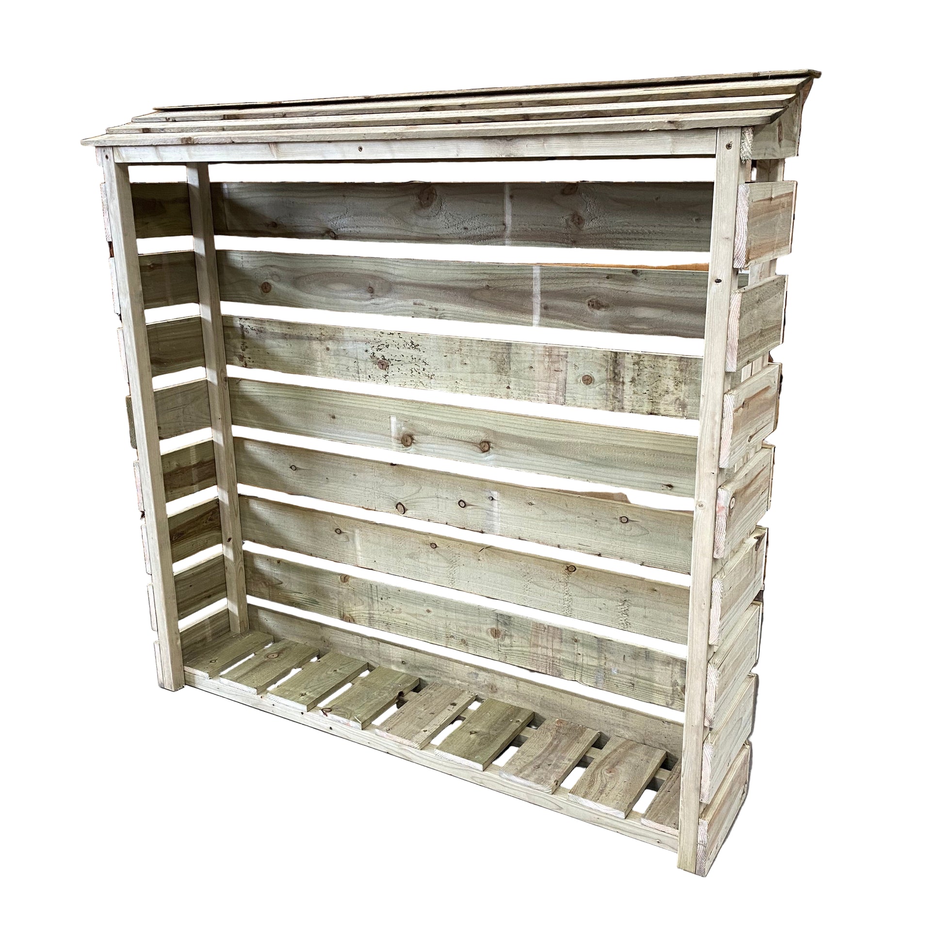 A wooden log store with a half depth design, constructed from pressure-treated TanalisedTM Timber, standing in a storage area with stacked wood in the background.